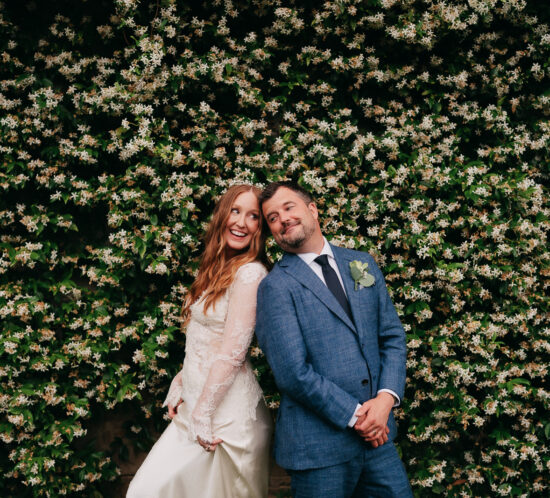 Bride and groom walking through the gardens in Sintra during their wedding day
